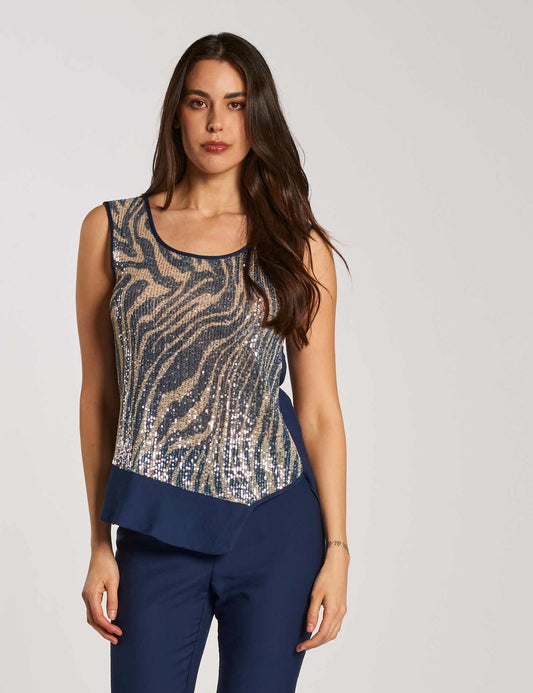 Top con volant e fronte di paillettes